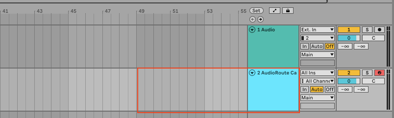 Ableton Live arrangement view showing two tracks: an empty '1 Audio' destination track on top and a '2 AudioRoute Ca' MIDI source track hosting AudioRoute Capture below