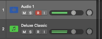 Logic Pro track headers showing the Audio track armed with a red Record Enable button, and the Software Instrument track unarmed below it
